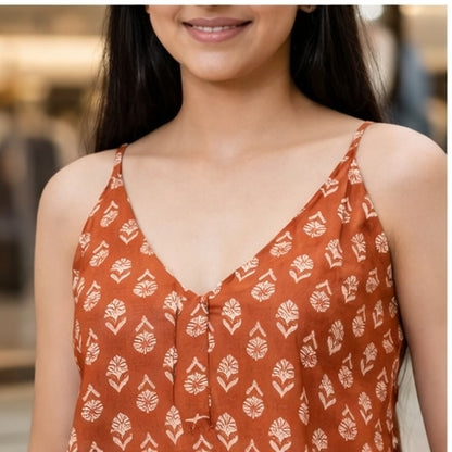 Rust orange printed cotton kurti top fabric close up showing ethnic print detail